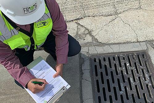 Consultant Checking Storm Drain