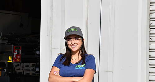 Girl Smiling in Frog Apparel
